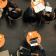 Customers and laptops in a coffee shop
